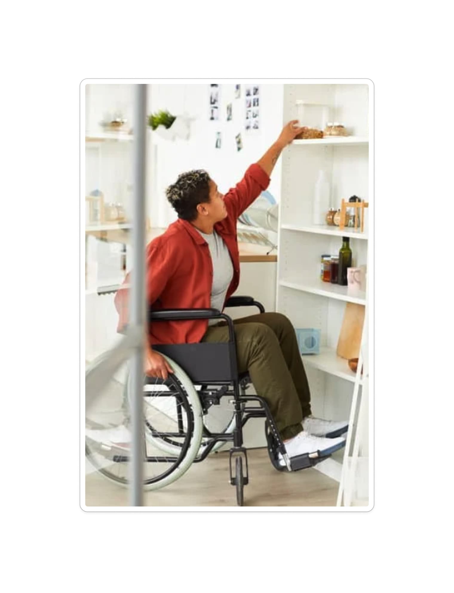 Person in wheelchair reaching for shelf - disability support